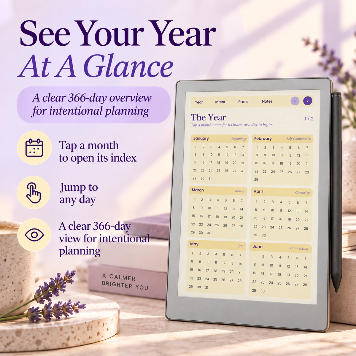 A tablet on stacked books with lavender sprigs, showing a digital year planner interface. Large promotional text reads 'See Your Year At A Glance' with icons for monthly overview, index tap, any-day jump, and clear daily view.